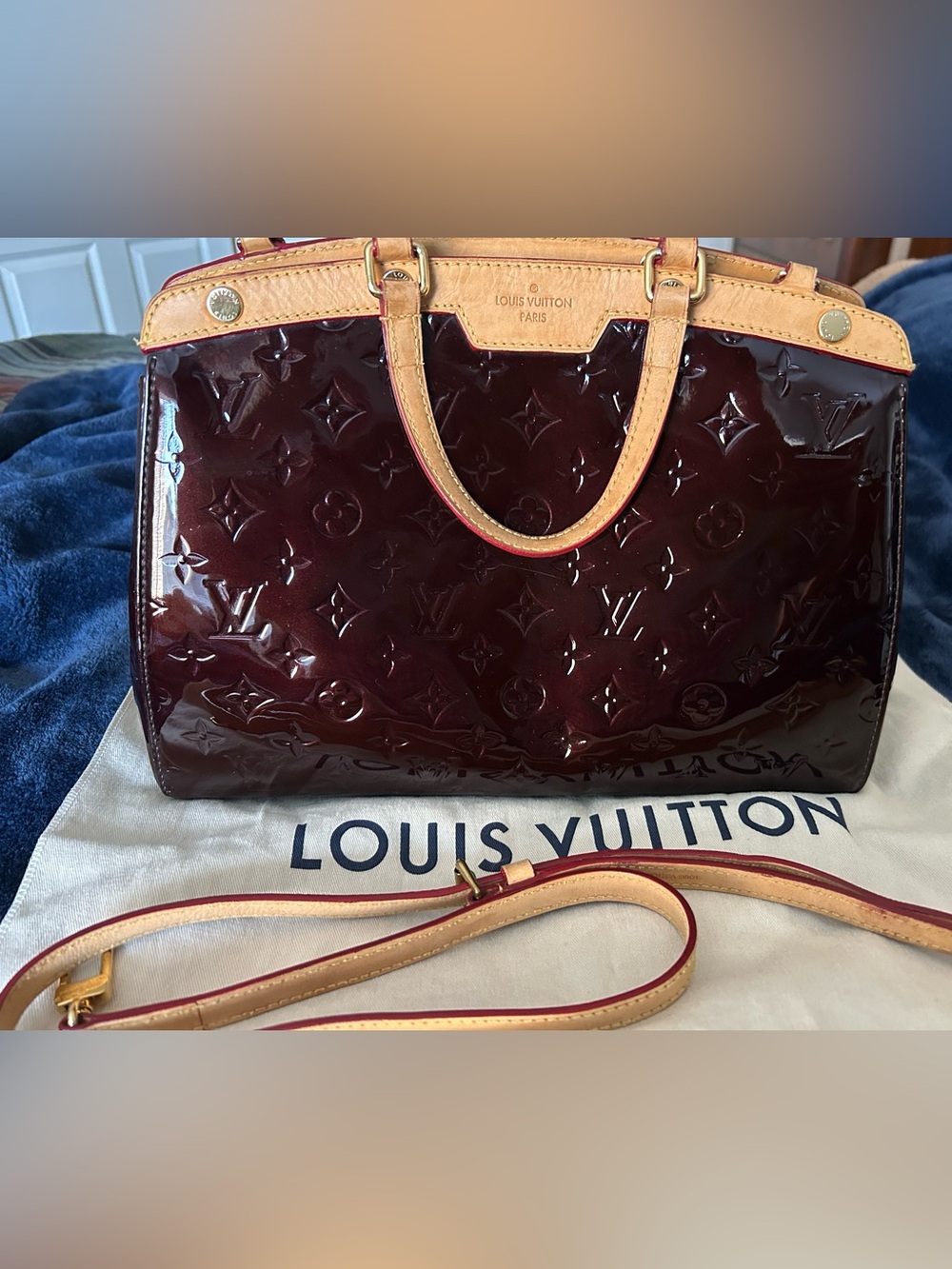 Authentic Louis Vuitton Brea in beautiful purple Vernis. Really lovely bag.